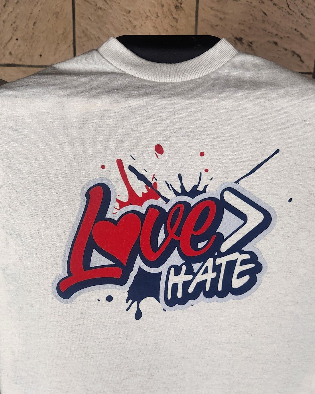 Love greater than Hate design close up